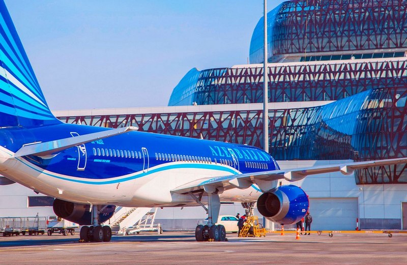 Azerbaijan Airlines aircraft in front of Baku airport terminal